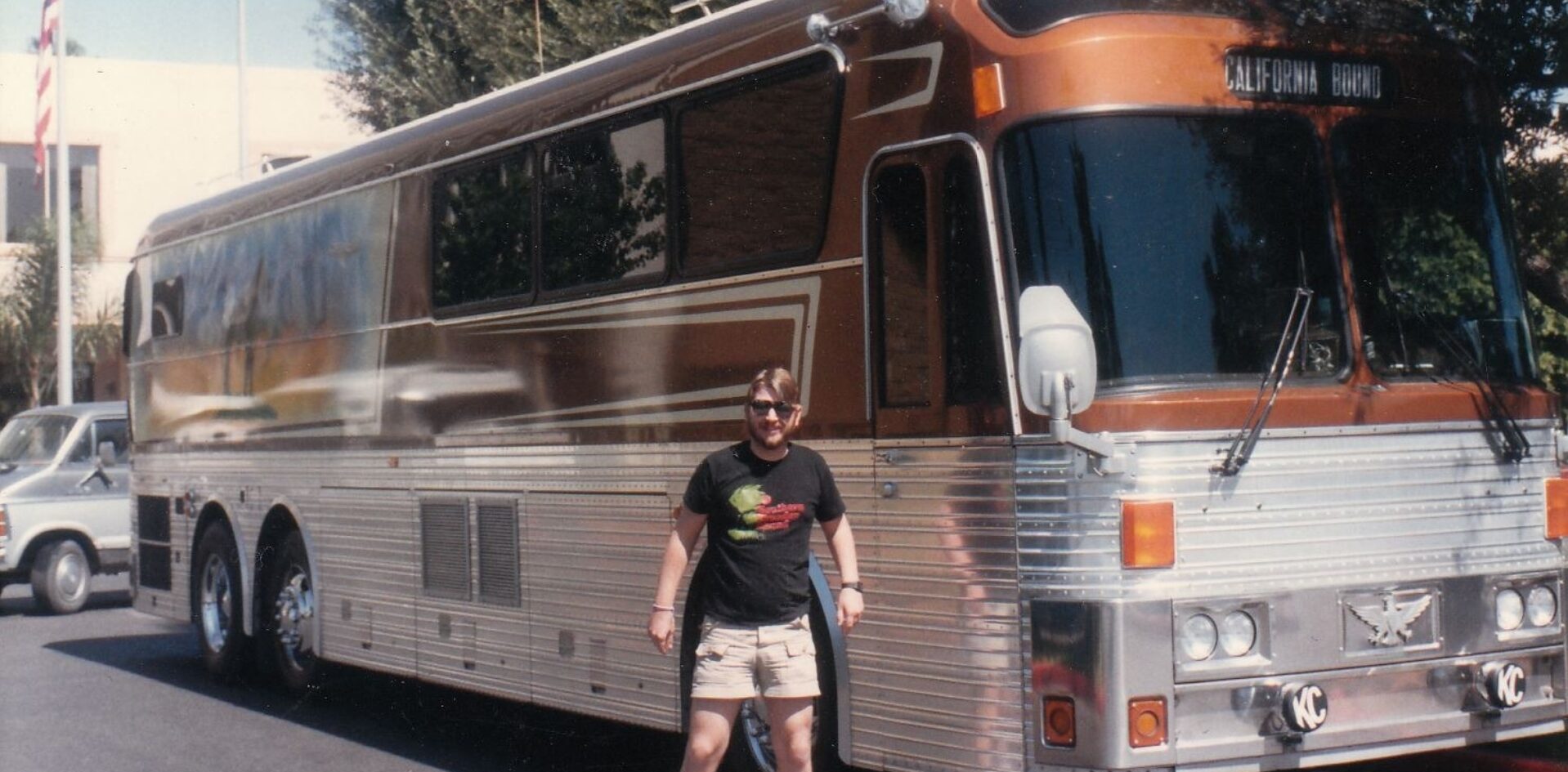 Sid Pierce next to tour bus